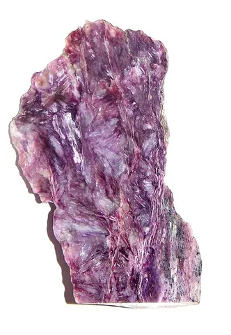charoite: a rare mineral, ranging in color from a light lilac to a deep purple, found in Yakutia, Russia