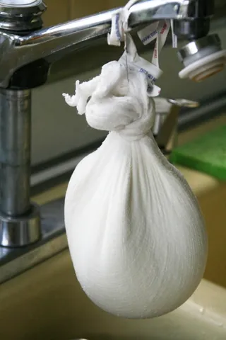 cheesecloth: a loosely woven cotton gauze, originally used to wrap cheese, but now used for various culinary...