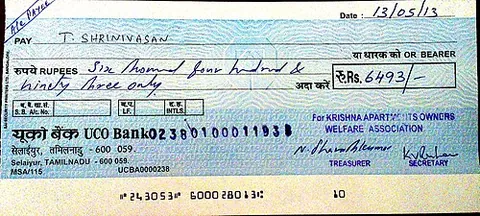 cheque: a written order directing a bank to pay money to a person or entity