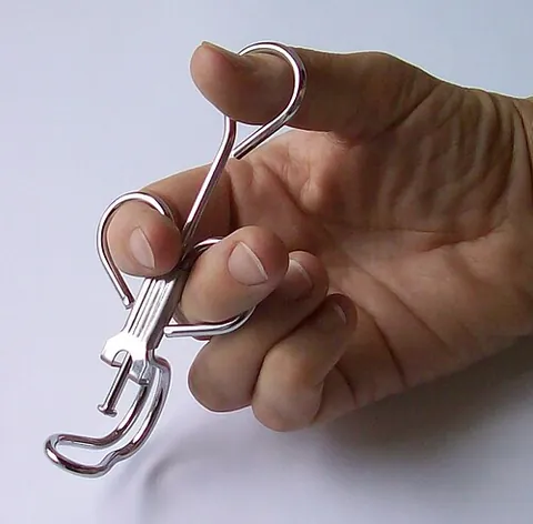 cherry pitter: a device, whether handheld or automatic, that removes pits from cherries