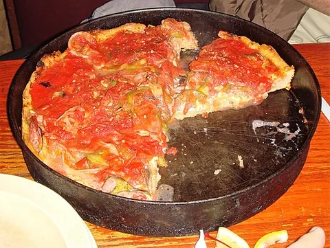 chicago-style pizza: a casserole-like deep-dish pizza with a characteristically high-edged crust on which the toppings...
