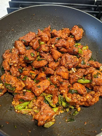 chicken 65: an Indo-Chinese dish consisting of deep-fried chicken and red chillies