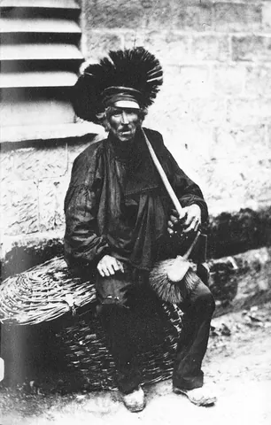 chimney sweep: a person whose job is to clean soot from chimneys