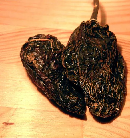 chipotle: a ripe jalapeño pepper, dried and smoked for use in cooking
