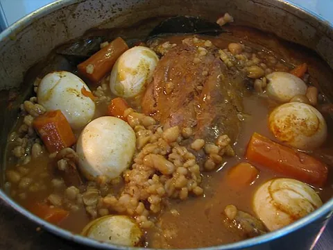 cholent: a meat and/or bean stew traditionally served on the Sabbath by Jews