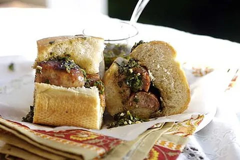 choripan: a sandwich consisting of grilled chorizo served in a bread roll, originating in Argentina and...