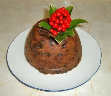 christmas pudding: a rich dessert traditionally eaten at Christmas, made from dried fruit and nuts