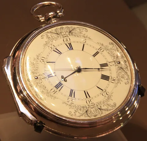chronometer: a device for measuring time, particularly a precision mechanism for measuring time of day