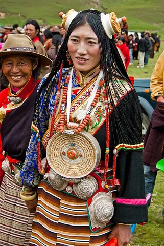 chuba: a long sheepskin coat made of thick wool, worn by Tibetans