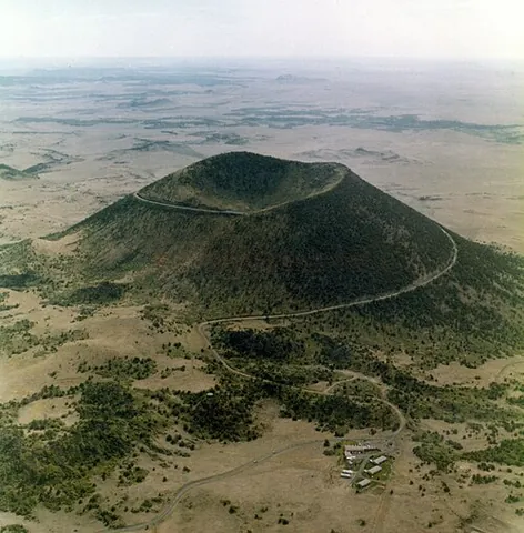 cinder cone: a conical deposit of rock fragments around a volcano