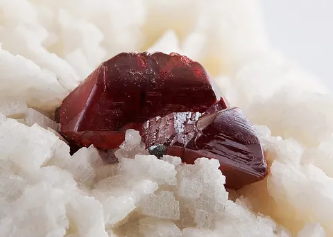 cinnabar: a deep red mineral, mercuric sulfide, HgS; the principal ore of mercury; such ore used as the...