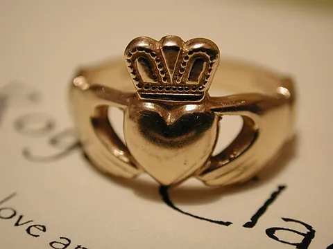 claddagh ring: a traditional Irish ring decorated with hands (representing friendship), a heart (love), and a...