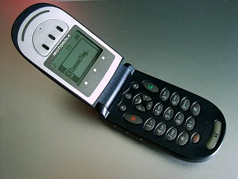 clamshell phone: a type of flip phone, where the fold-out is approximately the size of the other portion of the phone