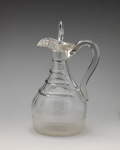 claret jug: a narrow-necked fancy jug for holding claret