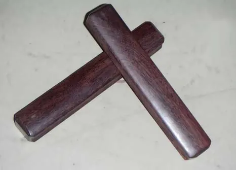 claves: a percussion instrument, consisting of two sticks or blocks, in which one is struck against the...