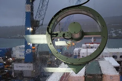 clear view screen: a circular disc of plate glass, set into the screen of a ship's bridge and spun at high speed by an...
