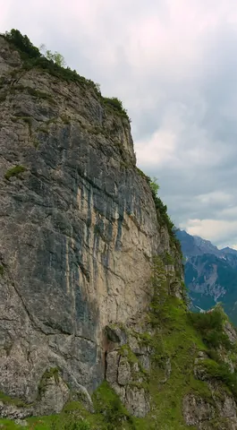 cliff: a vertical (or nearly vertical) rock face