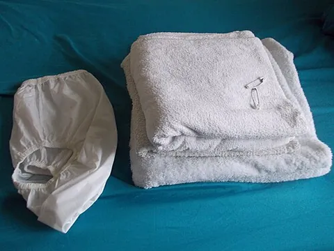 cloth diaper: a reusable diaper made of thick, durable cloth materials