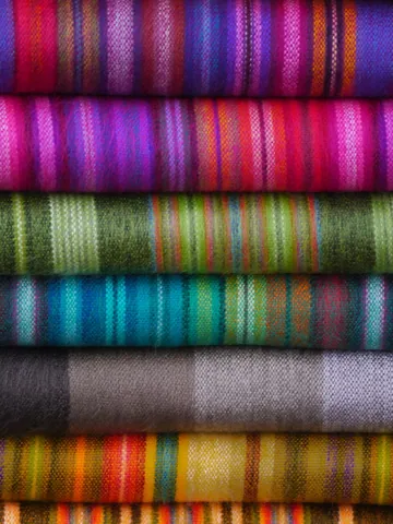 cloth: a fabric, usually made of woven, knitted, or felted fibres or filaments, such as used in dressing,...