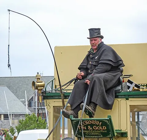 coachman: a man who drives a horse-drawn coach: a male coach driver