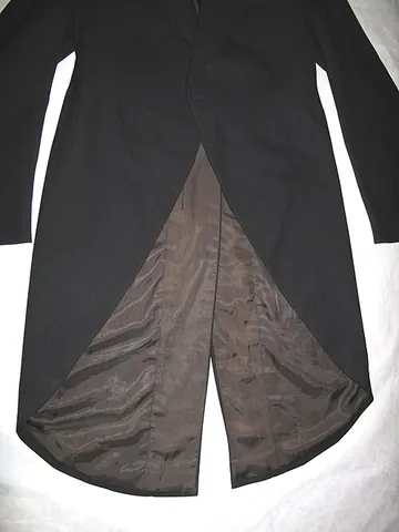 coattail: the flap at the back of a coat that hangs down, sometimes below the waist