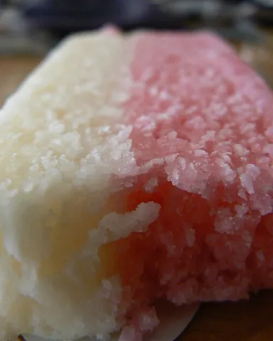 coconut ice: a chewy form of British confectionery prepared with grated (often desiccated) coconut, condensed...