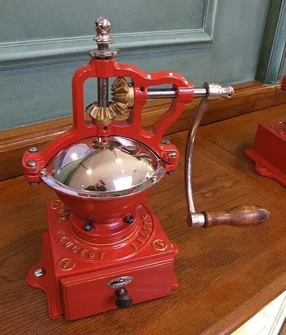coffee grinder: a device for pulverizing or powdering coffee beans so they can be brewed as coffee. (Technically...