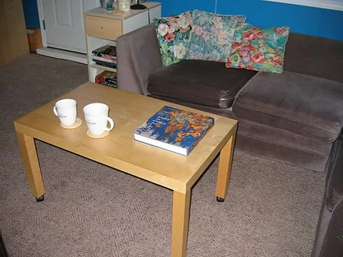 coffee table book: a large book, usually with lavish illustrations, typically displayed on a coffee table