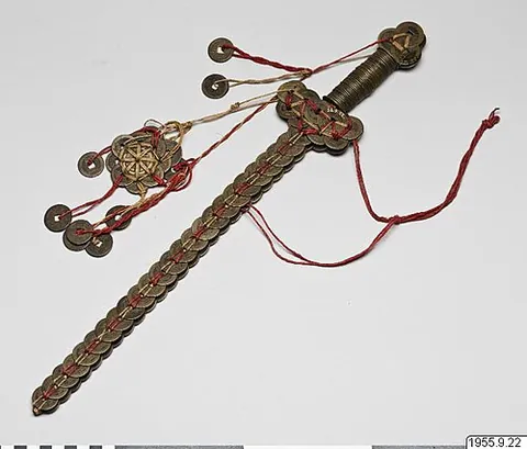 coin-sword: a type of Chinese numismatic charms that were primarily used in southern China to ward off evil...