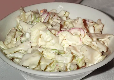 coleslaw: a salad of finely shredded raw cabbage and sometimes shredded carrots, dressed with mayonnaise...