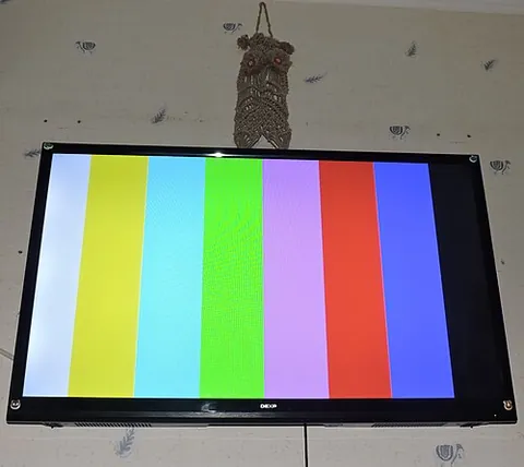 colour television: a colour system of transmitting and receiving television signals