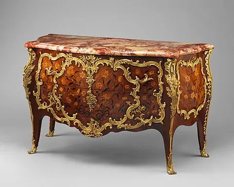 commode: a low chest of drawers on short legs