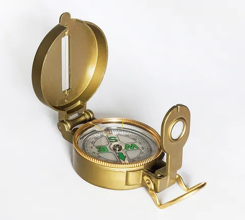 compass: a magnetic or electronic device used to determine the cardinal directions (usually magnetic or true...
