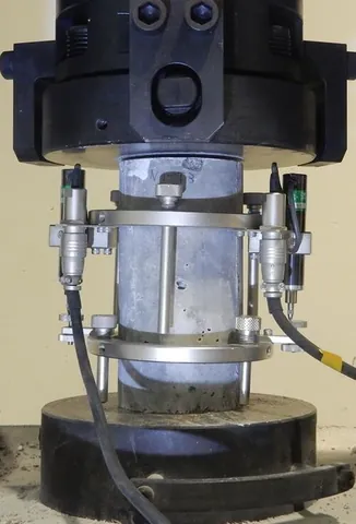 compressometer: a device used to determine the strain or deformation of a specimen while measuring the compressive...