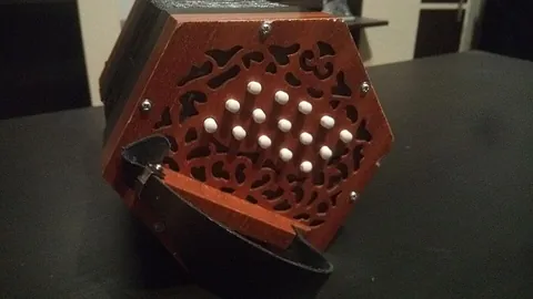 concertina: a musical instrument, like the various accordions, that is a member of the free-reed family of...