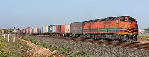container flat: a flat wagon designed to carry international shipping containers