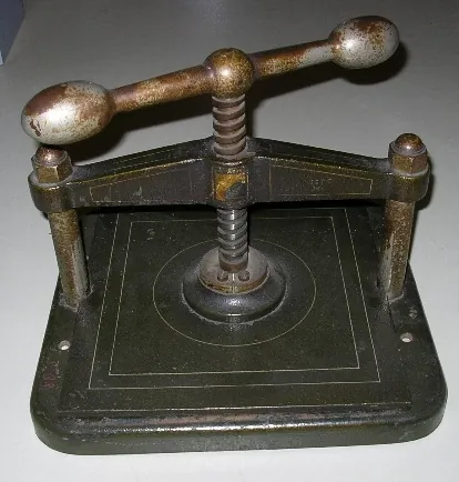 copying press: a machine for taking an exact copy, by pressure, of a document written in special ink on special...