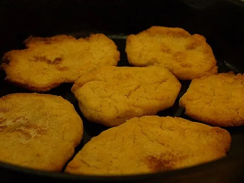 cornpone: a form of cornbread made without milk or eggs