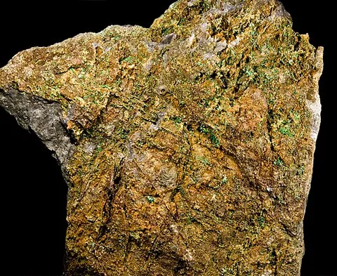 cornubite: a mineral containing arsenic, copper, hydrogen, and oxygen with chemical formula Cu₅(AsO₄)₂(OH)₄