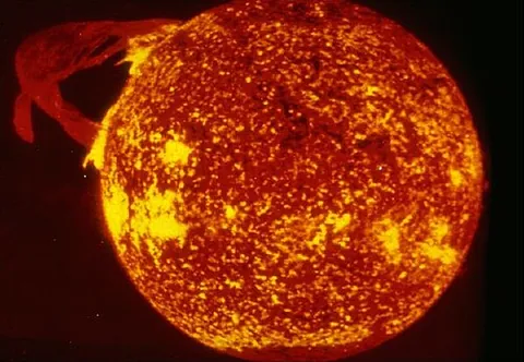 coronal mass ejection: a massive burst of solar wind, other light isotope plasma, and magnetic fields rising above the...