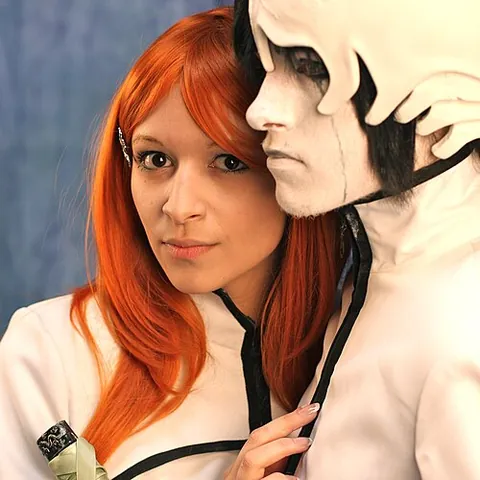 cosplayer: one who takes part in cosplay