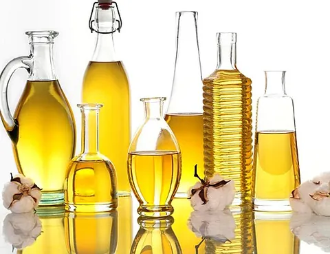 cottonseed oil: a pale yellow vegetable oil extracted from cottonseed; used in salad dressings, margarine, etc