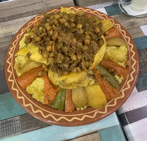 couscous: a pasta of North African origin made of crushed and steamed semolina