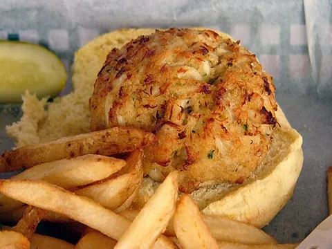 crab cake: a type of fishcake popular in the United States composed of crab meat and various other ingredients...