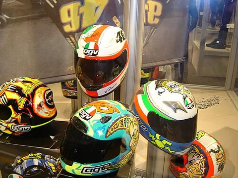 crash helmet: a helmet worn by motorcyclists worn to protect the head in case of an accident