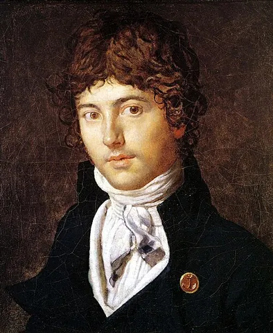 cravat: a wide fabric band worn as a necktie by men having long ends hanging in front