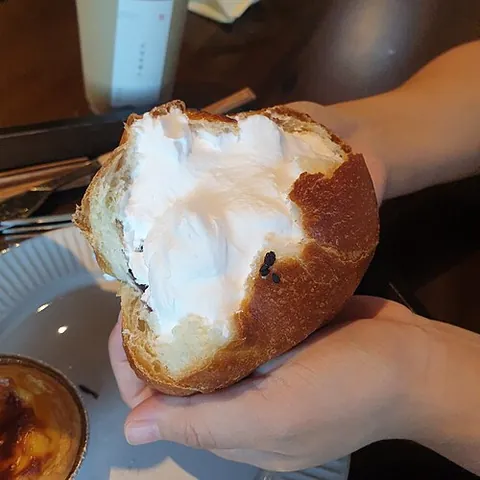 cream bun: a bun with a cream filling