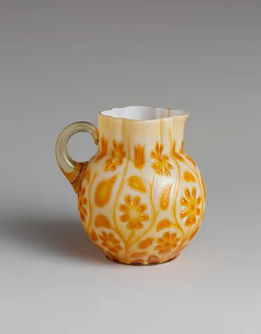 creamer: a jug for holding cream