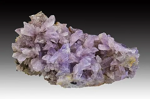 creedite: a monoclinic-prismatic mineral containing aluminum, calcium, fluorine, hydrogen, oxygen, and sulfur