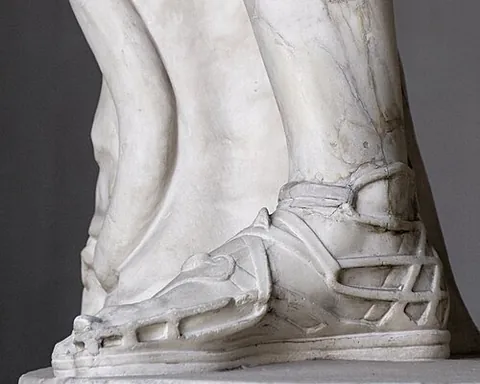 crepida: a type of footwear consisting of a sole attached to the foot with fairly elaborate straps,...